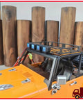 Badass Square Spot Light Fits H12Y 1/12 Scale Rc Crawler Rig on orange crawler with black roof rack.