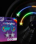 Color Changing Bike Spoke Lights Pack Of 2 With Star Shaped Clip On Wheel Lights glowing on bicycle wheel at night