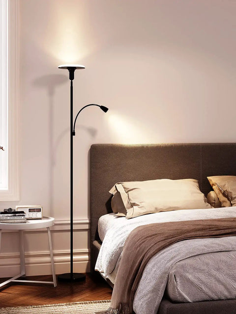 Torchiere Floor Lamp With Adjustable Reading Light Remote Control And Foot Switch Dual Light Setup in cozy bedroom, black design