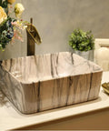 USZWBY Marbling Vessel Sink - Rectangular Ceramic Bathroom Sink with Faucet & Drain Above Counter Vanity Bowl Stylish Art Wash Basin for Modern Bathrooms in a stylish setting.