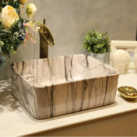 USZWBY Marbling Vessel Sink - Rectangular Ceramic Bathroom Sink with Faucet & Drain Above Counter Vanity Bowl Stylish Art Wash Basin for Modern Bathrooms in a stylish setting.