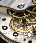Quartz Clock Mechanism Parts Kit With Nuts And Washers, 20 Sets For DIY Clock Repair, Replacement Clock Movements, Easy Install For Quick Fixes, Includes Nut And Washer Hardware For Secure, Long Lasting Clock Repair. close-up of gears and washers