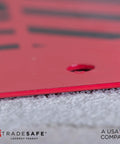 Close-up of Real Tough Heavy Duty Lockout Tagout Locks Station corner, red powder-coated steel, for industrial worksites safety.