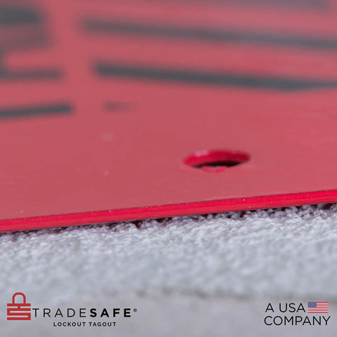 Close-up of Real Tough Heavy Duty Lockout Tagout Locks Station corner, red powder-coated steel, for industrial worksites safety.