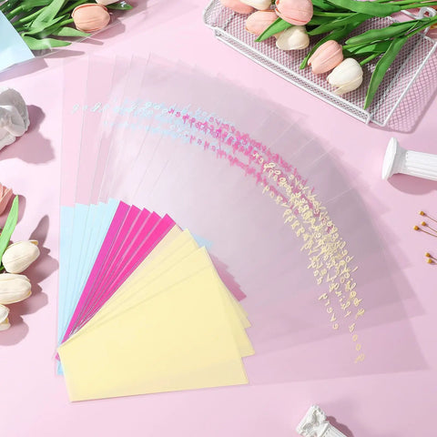 Disposable OPP Flower Sleeve Bags for Bouquets 150 Pack Clear Floral Packaging Wrap arranged on pink background with tulips