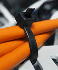 Beefy 24 Inch Cable Ties Pack Of 50 With 200 Lbs Tensile Strength, UV resistant black nylon zip tie securing orange cables