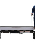 Heavy Duty Steel Mechanical Dock Leveler Equipped With A Beefy 66 Inch Ramp Width And Rock Solid 25000 Lb Load Rating features worker using it.