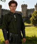 Man in Epic Seven Piece Renaissance Costume Set For Men With Faux Leather Pauldron Shoulder Armor Bracers outside castle