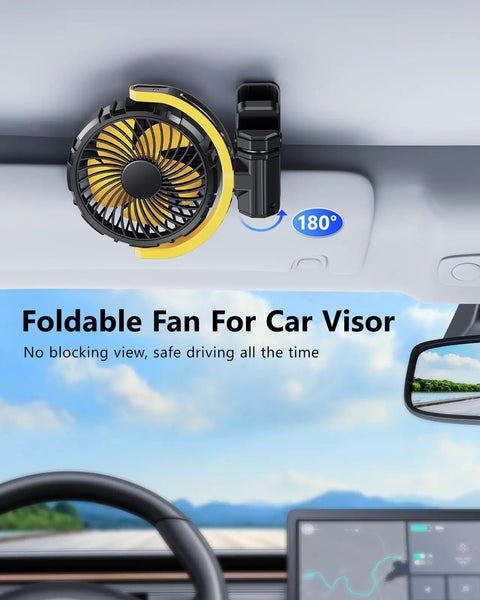 Battery Powered Clip On Car Fan For Visor And Back Seat in yellow clipped to car visor.