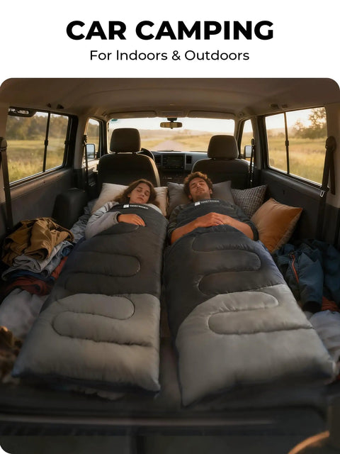 Two people using Lightweight 3lb Backpacking Sleeping Bag For Adults And Kids With Compression Sack inside a car for camping.