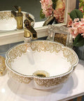 USZWBY Bathroom Vessel Sink, Countertop Basin Ceramic Sink with gold floral design and single faucet hole.