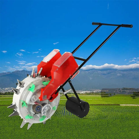 Hand Push Garden Seeder with dual seed and fertilizer buckets on a field with mountains in the background.