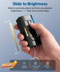 Ultimate Outdoor String Light Dimmer With Hella Smooth Stepless Slider For 10 To 100 Percent Brightness Control held in hand.