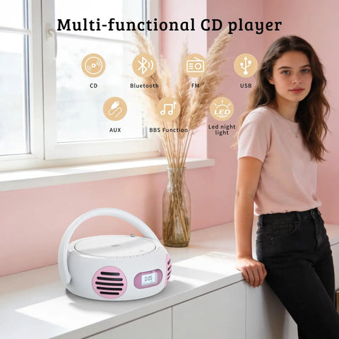 All In One Portable Boombox CD Player With Bluetooth for home or outdoors, displayed on a windowsill with a person nearby.