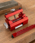 Shop Ready Fixed Angle Sharpening Jig With Built Tough Rigid Metal Frame And Knurled Tightening Knob on wooden workbench.