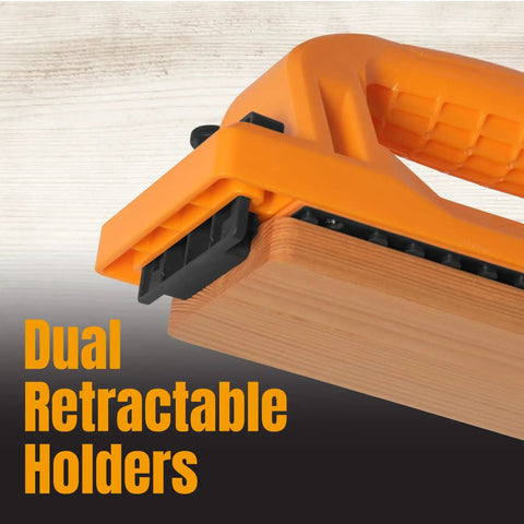 Close-up of the Grab Push Block with Retractable Holder and Offset Handle, showing dual retractable holders for material control.