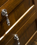 Vintage Drop Cabinet Pulls Polished Nickel Zinc Alloy Retro Dresser Knobs on wooden drawer close-up