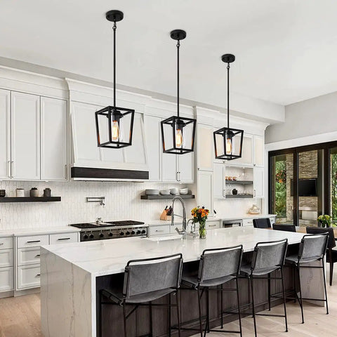 Black Pendant Lights For Kitchen Island, Modern Lantern Fixtures With Clear Glass Shades in a contemporary white kitchen