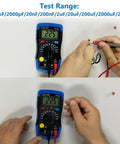 Person testing resistor with Capacitor Tester And Digital Multimeter Capacitance Meter 200pF To 20mF Handheld, two units shown