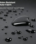 Close-up of water-resistant outer fabric showing droplets of water on a black surface, ideal for Premium Bike Tailgate Pad For Cybertruck Featuring Heavy Duty Hook And Loop Straps And Protective Cushioning To Keep Your Ride Locked And Loaded For Stress Free Weekday Hauls And Off Road Weekend Runabouts.