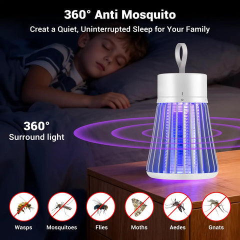 Portable Mosquito Zapper For Indoor And Outdoor Use USB Rechargeable Electric Fly Swatter With Safe Grid And Purple LED on a table by sleeping child