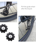 4X 10T Bicycle Gear Mech Pulley Jockey Wheel Kit Universal For 5,6,7,8 Speed Derailleur shown on bike rear wheel