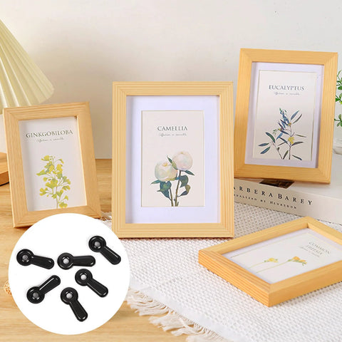 Black photo frame turn-button fasteners; 300-pack shown with four wooden frames