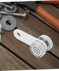Heavy Duty Iron Dual Bearing Caster Wheels For Sliding Gates And Barn Doors featuring a close-up view of the wheel assembly on a wood surface.
