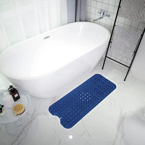 Extra Long Non Slip Bath Mat 39 X 16 Inch Machine Washable Shower Rug With Heavy Suction Cups And Fast Drain Holes Navy Blue next to a bathtub.