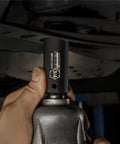 Close-up of 3/4 socket from 1/2-Inch Drive Deep Impact Socket Set Cr-V 6-Point 11 SAE Sockets in use on automotive part