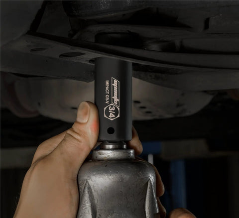 Close-up of 3/4 socket from 1/2-Inch Drive Deep Impact Socket Set Cr-V 6-Point 11 SAE Sockets in use on automotive part
