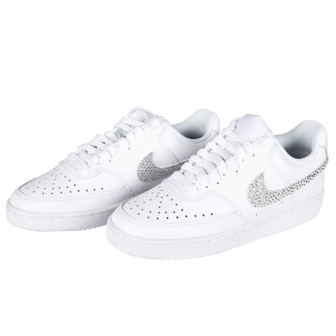 White sneakers with rhinestone design, captured at an angle from above, showcasing details suitable for Liquid Fusion Heavy Duty Craft Glue For Rhinestones And Glitter, Waterproof And Crystal Clear Dries Non-Toxic, Strong Bond For Diamond Art And DIY Projects, Indoor Outdoor 4 Fl Oz use.