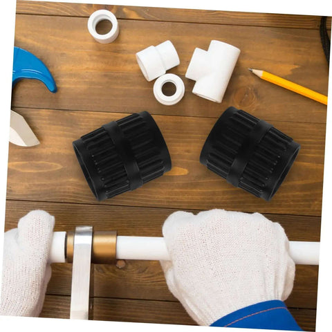 Tubing Deburring Reamer Set 2 Pcs Inner Outer Reamer Tool For Pipes Quick Chamfering Edge Removal DIY Friendly Copper And Plastic Tube Deburr Tool Plumbing Essential For Smooth Clean Pipe Ends on wooden surface with gloves holding pipe