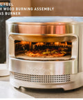 Pi Pizza Oven With Wood Or Gas Burner for Backyard Pizza Nights, stainless steel design with pizza on cordierite stone surface