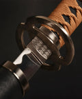 Close-up of the brown handle part of a 40 Inch Metal Cosplay Katana With Reverse Blade From Rurouni Kenshin Himura Anime Sword