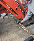 Four Pack Three Eighth Inch Grade 70 Binder Chain With Clevis Grab Hooks For Tow and Recovery G70 Transport Chain attached to machinery.