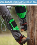 Adjustable Tree Climbing Spikes Set For Safe Climbing, Fruit Picking, And Hunting with leg-safe comfort straps in use on tree.