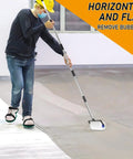 Worker using Spike Roller For Self Leveling Cement Kit Featuring A 9 Inch Screed Spiked Roller With A 77 Inch Extension Pole for epoxy flooring.