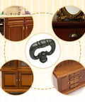 Solid As A Rock Matte Black Ring Knobs For Kitchen Cabinets And Bedroom Drawers Vintage Drop Design shown on wooden cabinet.