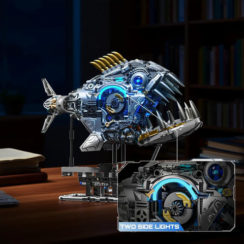 Myth Qholve Mechanical Piranha Building Block Kit With Hand Crank Gear System Multi Joint Motion Toy assembled on desk with lights