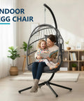 Outdoor Indoor Hanging Egg Chair With Stand Cushioned Swing Seat In Dark Grey Wicker Hammock For Patio Or Bedroom Weather Resistant PE Wicker Ergonomic Comfort 350 Lbs Capacity, in living room with mother and child sitting