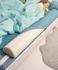 Safe toddler sleeping next to the Skip The Worry With This Ultra Cozy Foam Bed Bumper That Anchors Toddler Squad Firmly Against Dangerous Nighttime Roll Outs While Granting Parents Unrestricted Access.