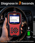 Hand holding Beefed-Up All-In-One Volkswagen Group OBD2 Scan Tool For Volkswagen Audi Skoda Seat With Battery Registration And EPB Reset OBD11 VD700 inside car