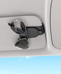 Premium Magnetic Sunglass Holder for Car Visor 2 Pack Soft Faux Leather Eyeglasses Clip holds sunglasses on car visor.