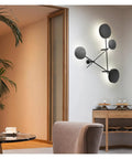 Top Shelf Round Led Wall Sconce Lighting For Bedroom Bedside Decor Featuring Smooth 360 Degree Rotation Matte Black Iron Industrial Loft Fixture Serving Clean Soft Glow with modern design.
