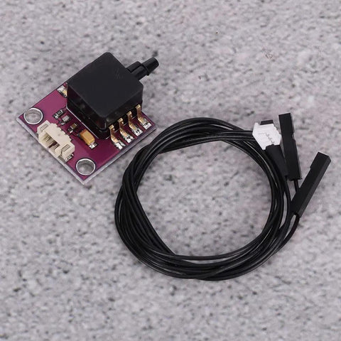 Compact Breakout Pressure Sensor Board For Microcontrollers And Prototyping with connecting cables on light surface