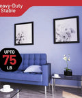 Complete 303 Piece Picture Hanging Hardware Kit With Heavy Duty Wall Hooks Drywall Anchors And Screw Assortment For Rock Solid Gallery Displays No Sweat Installation in a modern living room setting.