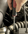 20 Piece Phillips Slotted And Torx Screwdriver Set With Ergonomic Tri Lobe Dual Material Handles And Speed Zone Design For Fast Comfortable Grips And Non Slip Bits For DIY Pros being used on an engine component.