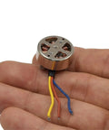 2750KV Outrunner Brushless Motor For FPV Racing Drones And RC Planes, in hand, showing beefy aluminum housing, low heat operation, 1Pcs 1503 Motor