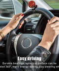 Woodgrain Steering Wheel Spinner Knob for Easy One Hand Driving installed on black steering wheel in car interior